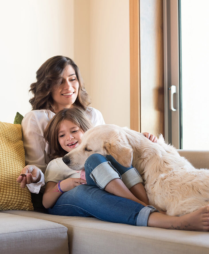 Family relaxing comfortably at home